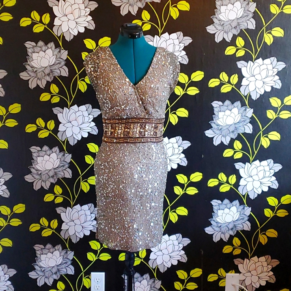 By Sohail K. size small with silver gray and bronze